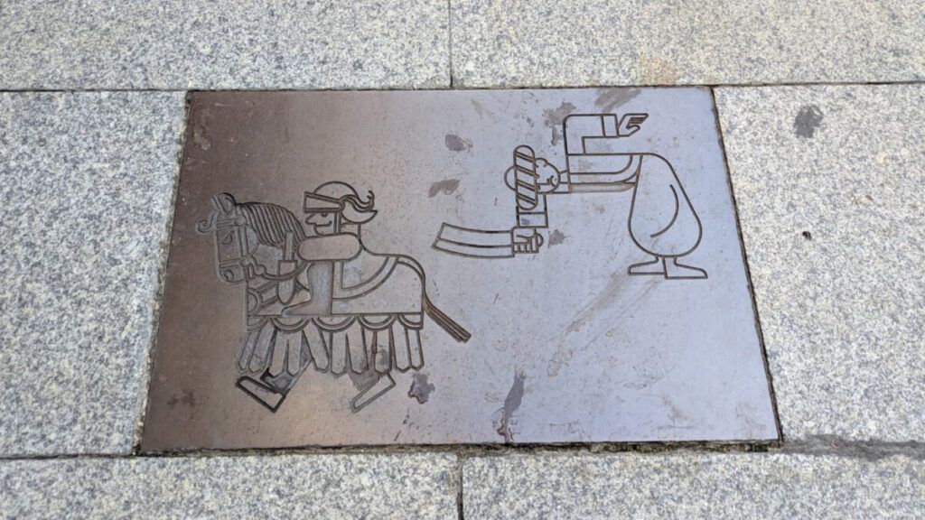 Rajoles de la plaça de Sant Joan, amb dibuixos de la Patum de Josep Maria de Martín